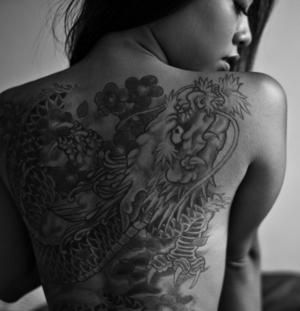 Back tattoo for ladies