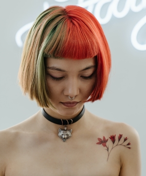 Red Ink Flower Tattoo
